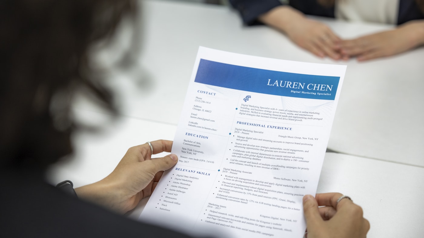 A stack of applications on a desk