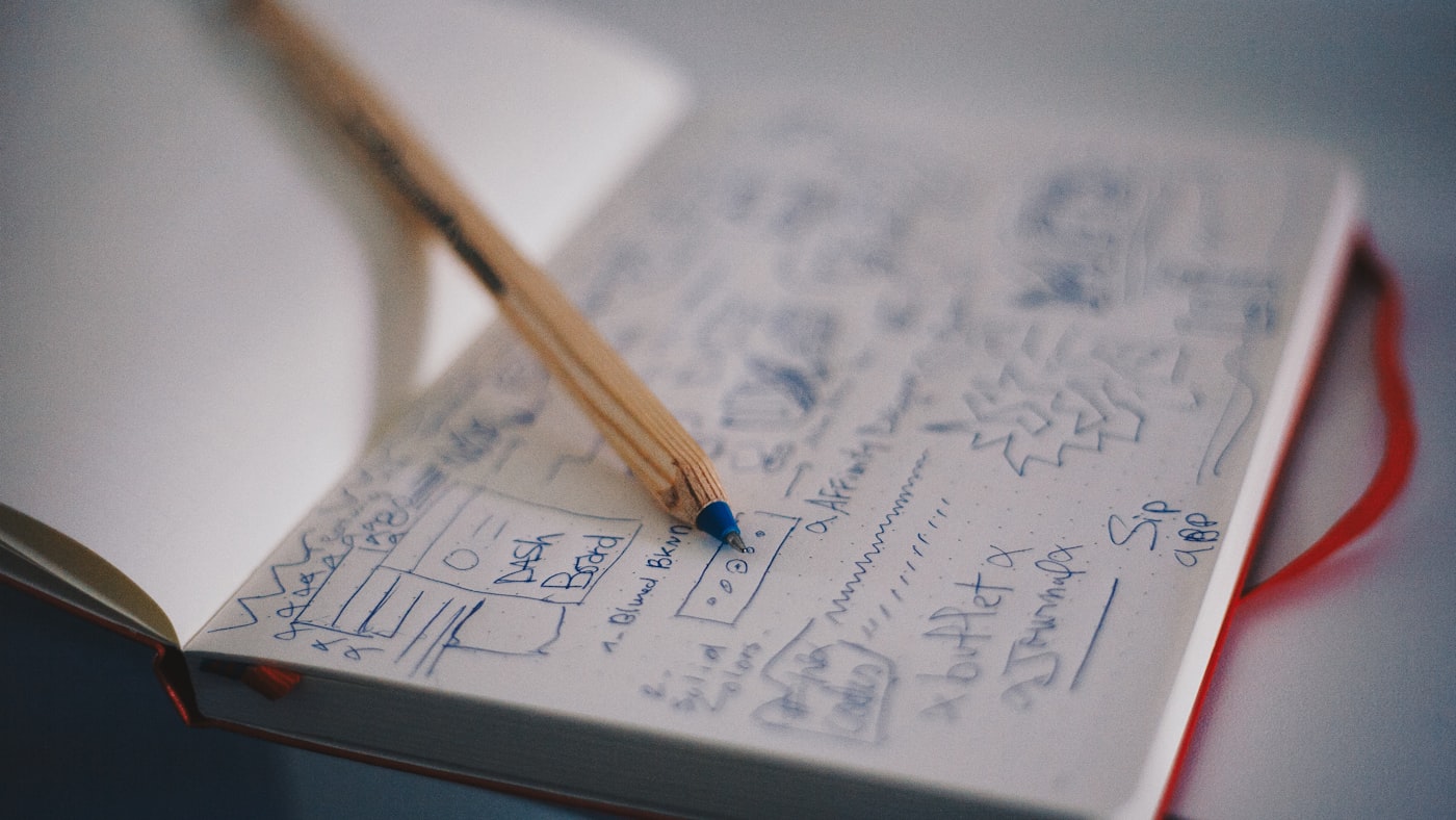 A designer sketching by hand